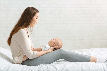 A mother holding her baby